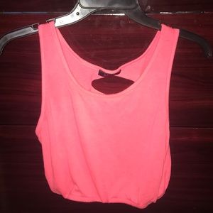 MUST GO ASAP Pink open back crop top.